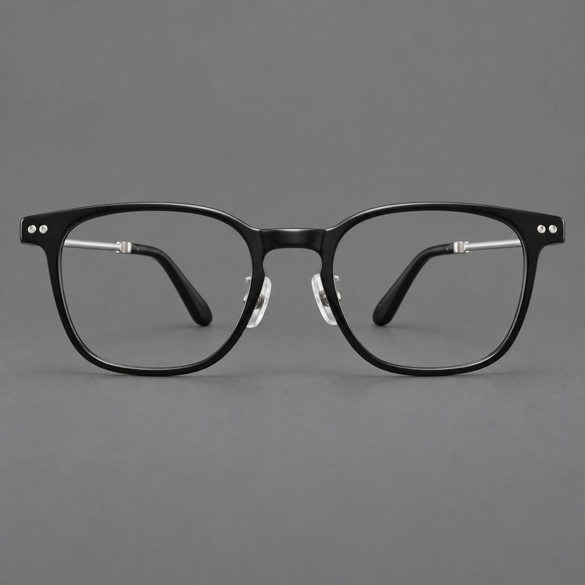 Montatura vintage in acetato e titanio con linee quadrate morbide e rivetti doppi — immagine del prodotto