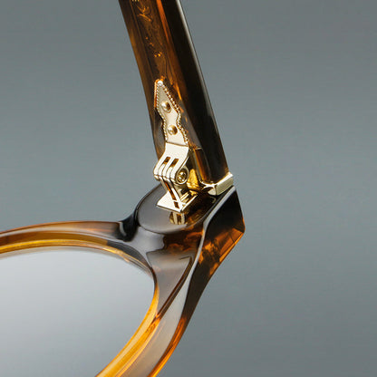 Montatura rotonda vintage in acetato con ponte a chiave e aste larghe — dettaglio 19