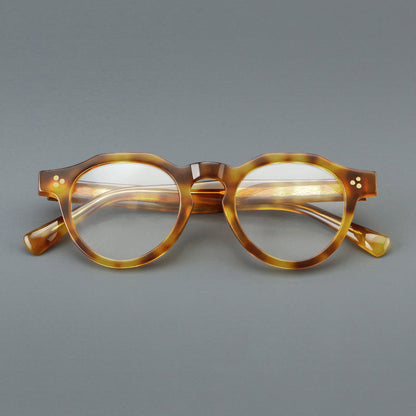 Montatura rotonda vintage in acetato con ponte a chiave e tripli rivetti — dettaglio 15