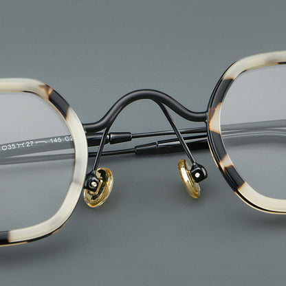 Montatura rotonda geometrica vintage con ponte arcuato rialzato e naselli — dettaglio 7
