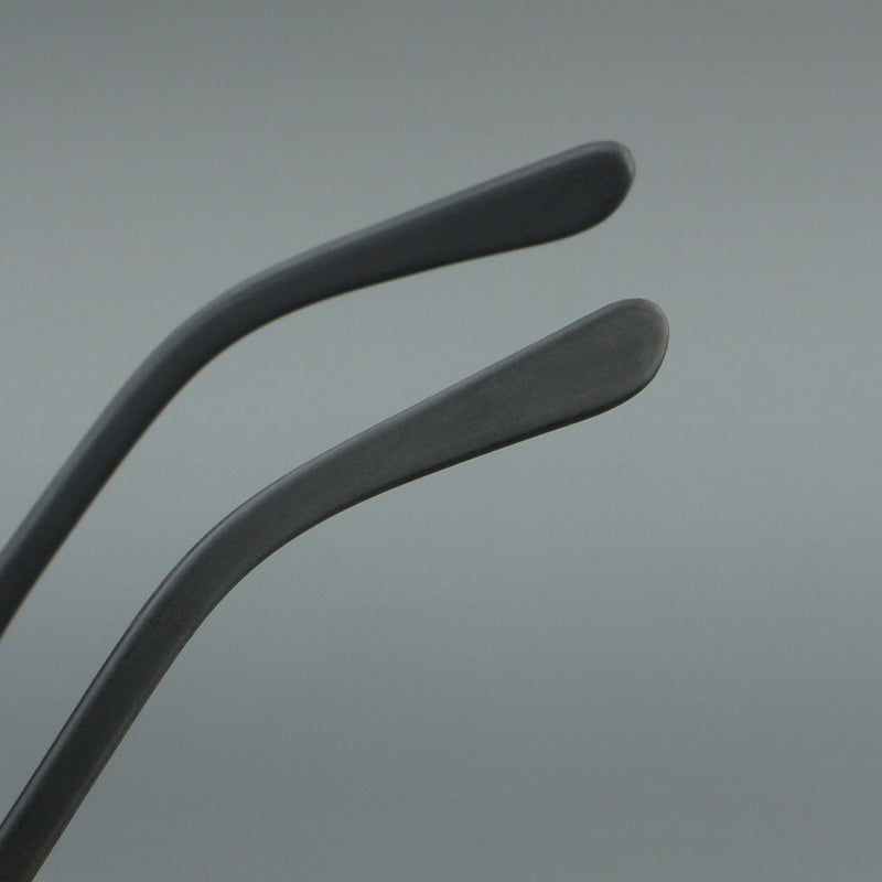 Montatura rotonda essenziale in acetato con cerchi lisci e aste lineari — dettaglio 18