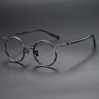 Montatura rotonda vintage in titanio con ponte in metallo, disponibile in più modelli — dettaglio 5