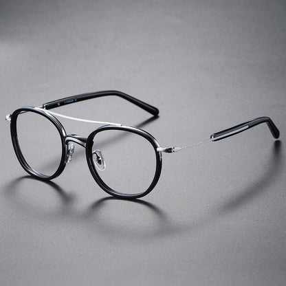 Montatura rotonda vintage in titanio con ponte in metallo, disponibile in più modelli — dettaglio 9