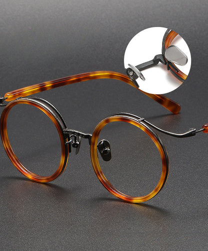 Montatura rotonda vintage in titanio con ponte in metallo, disponibile in più modelli — dettaglio 8