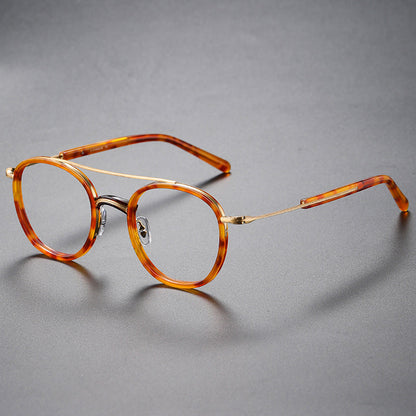 Montatura rotonda vintage in titanio con ponte in metallo, disponibile in più modelli — dettaglio 6