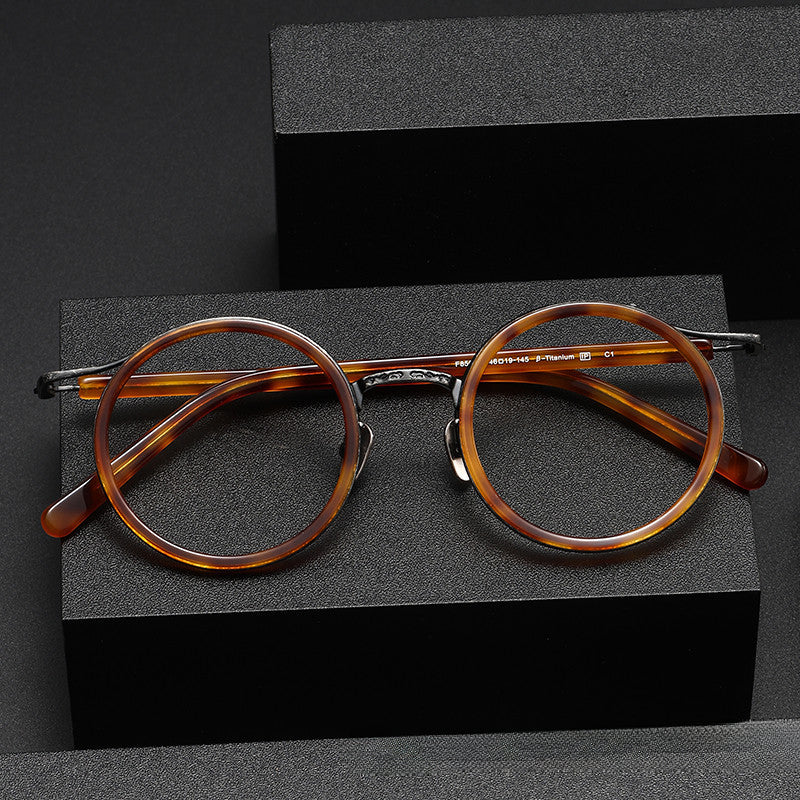 Montatura rotonda vintage in titanio con ponte in metallo, disponibile in più modelli — dettaglio 4
