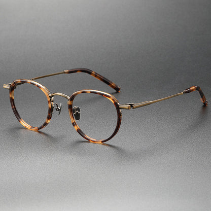 Montatura rotonda vintage in titanio con ponte in metallo, disponibile in più modelli — dettaglio 13