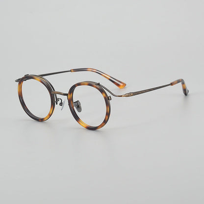 Montatura rotonda vintage in titanio con ponte in metallo, disponibile in più modelli — dettaglio 14