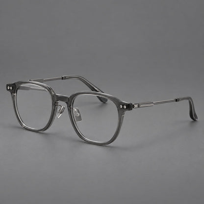 Montatura vintage in acetato e titanio con bordi quadrati arrotondati e aste traforate — immagine del prodotto