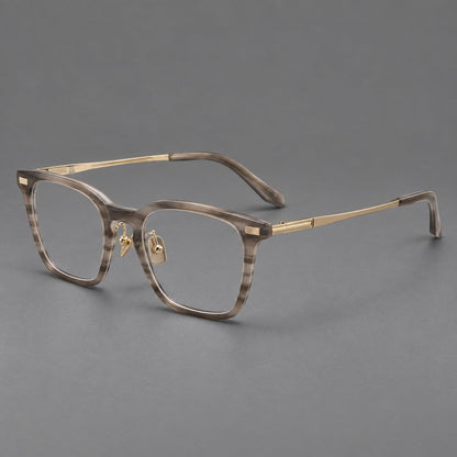 Montatura classica in acetato e titanio con bordi quadrati arrotondati e angoli lavorati — immagine del prodotto