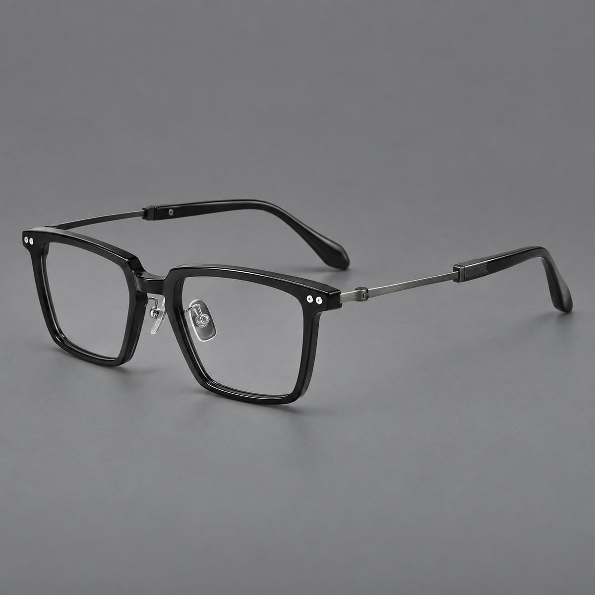 Montatura classica in acetato e titanio con bordo diritto e forme rettangolari arrotondate — immagine del prodotto