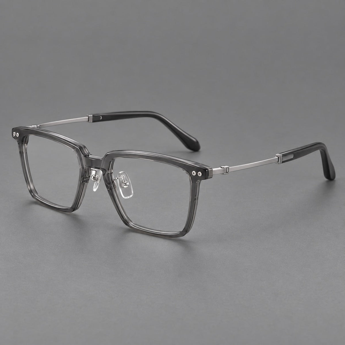 Montatura classica in acetato e titanio con bordo diritto e forme rettangolari arrotondate — immagine del prodotto