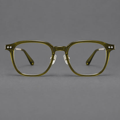 Montatura vintage in acetato e titanio con bordi quadrati arrotondati e aste traforate — immagine del prodotto