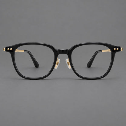 Montatura vintage in acetato e titanio con bordi quadrati arrotondati e aste traforate — immagine del prodotto