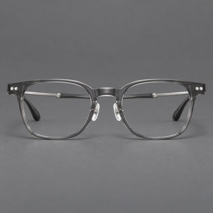 Montatura vintage in acetato e titanio con linee quadrate morbide e rivetti doppi — immagine del prodotto