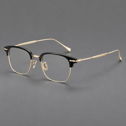 Montatura browline in acetato e titanio con bordi inferiori sottili e angoli decorati — immagine del prodotto