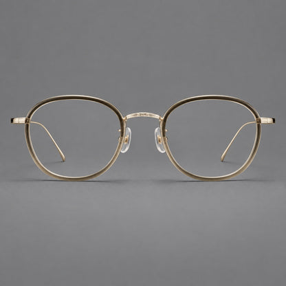 Montatura rotonda vintage in acetato e titanio con ponte inciso e aste sottili — immagine del prodotto