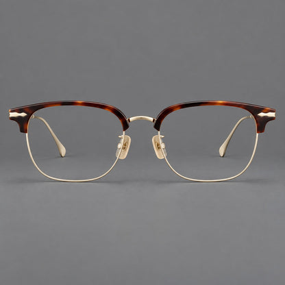 Montatura browline in acetato e titanio con bordi inferiori sottili e angoli decorati — immagine del prodotto