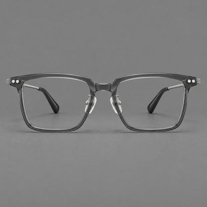 Montatura classica in acetato e titanio con bordo diritto e forme rettangolari arrotondate — immagine del prodotto