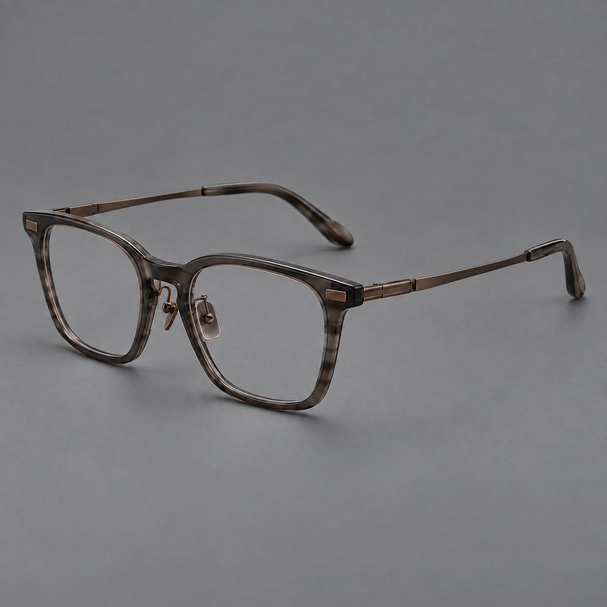 Montatura classica in acetato e titanio con bordi quadrati arrotondati e angoli lavorati — immagine del prodotto