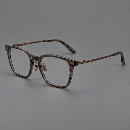Montatura classica in acetato e titanio con bordi quadrati arrotondati e angoli lavorati — immagine del prodotto