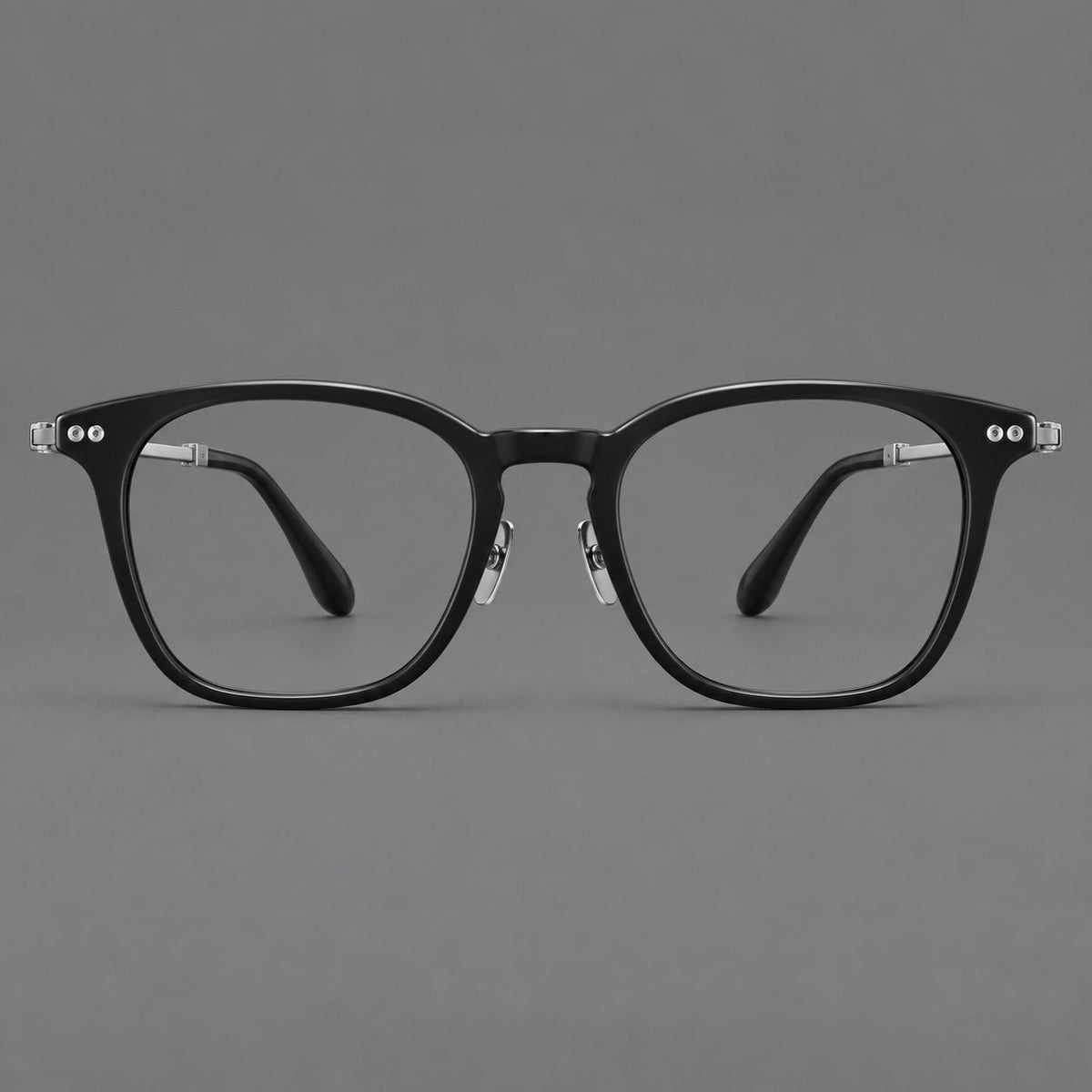 Montatura rétro in acetato e titanio con linee quadrate morbide e cerniere circolari — immagine del prodotto